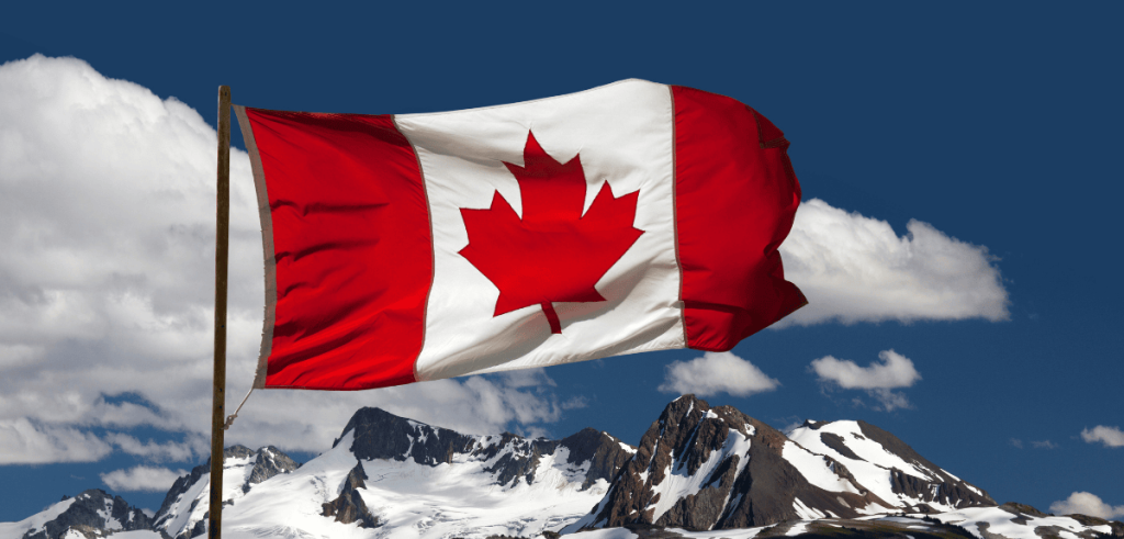 canada flag on the rockies