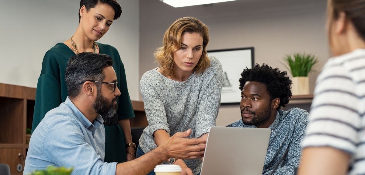 Image of a team of professionals at work. Global Talent Visa.